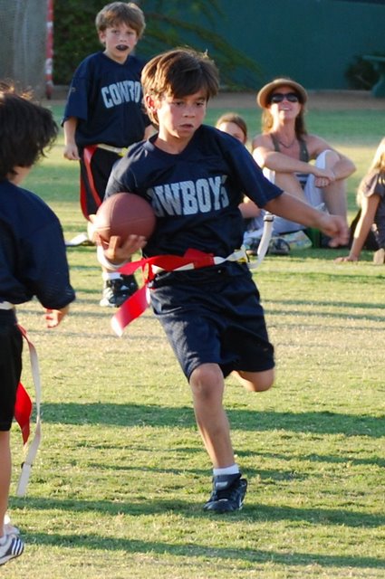 Quarterback Shane Skelly led the Cowboys to the Palisades Recreation Center's Majors Division flag football title last week.